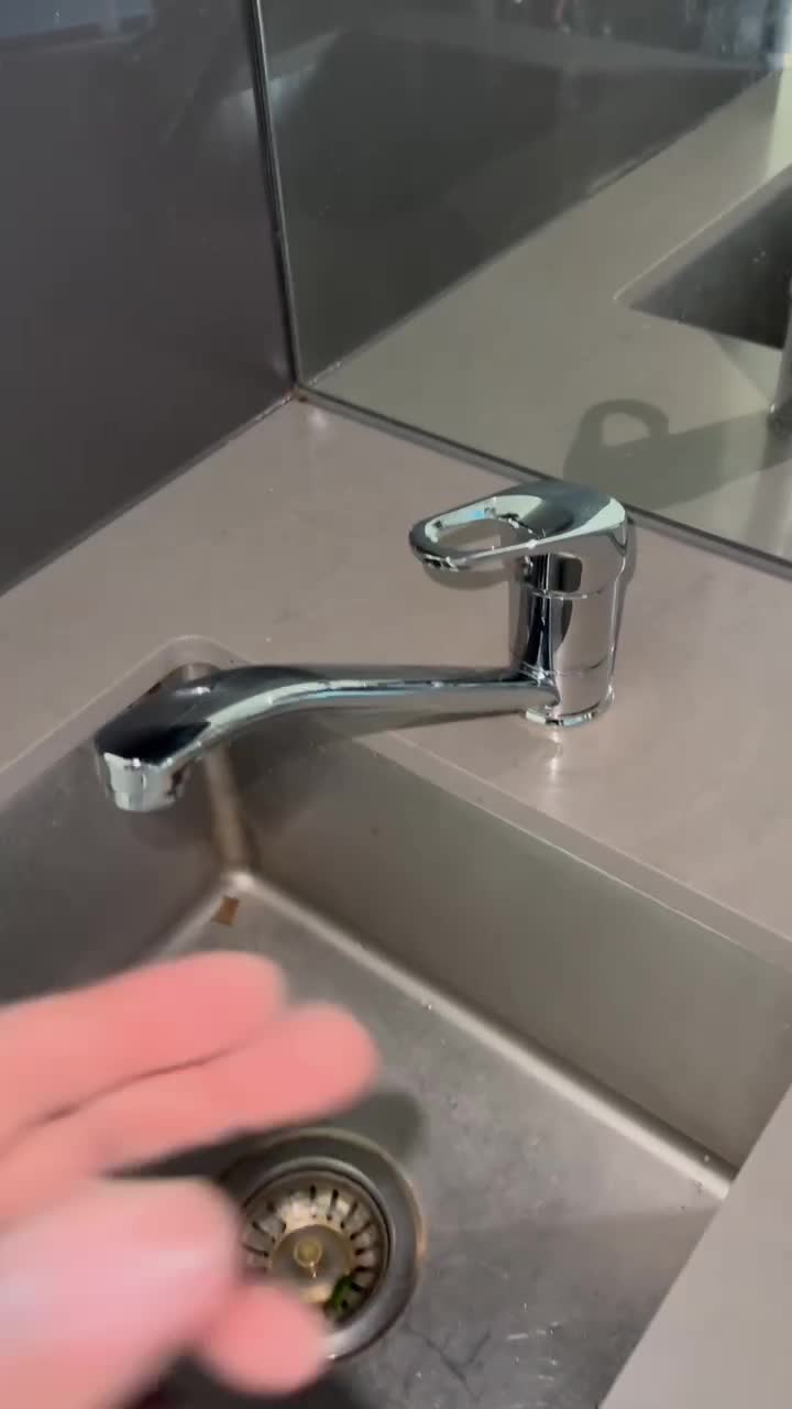 Installed kitchen mixer beside the completed sink area